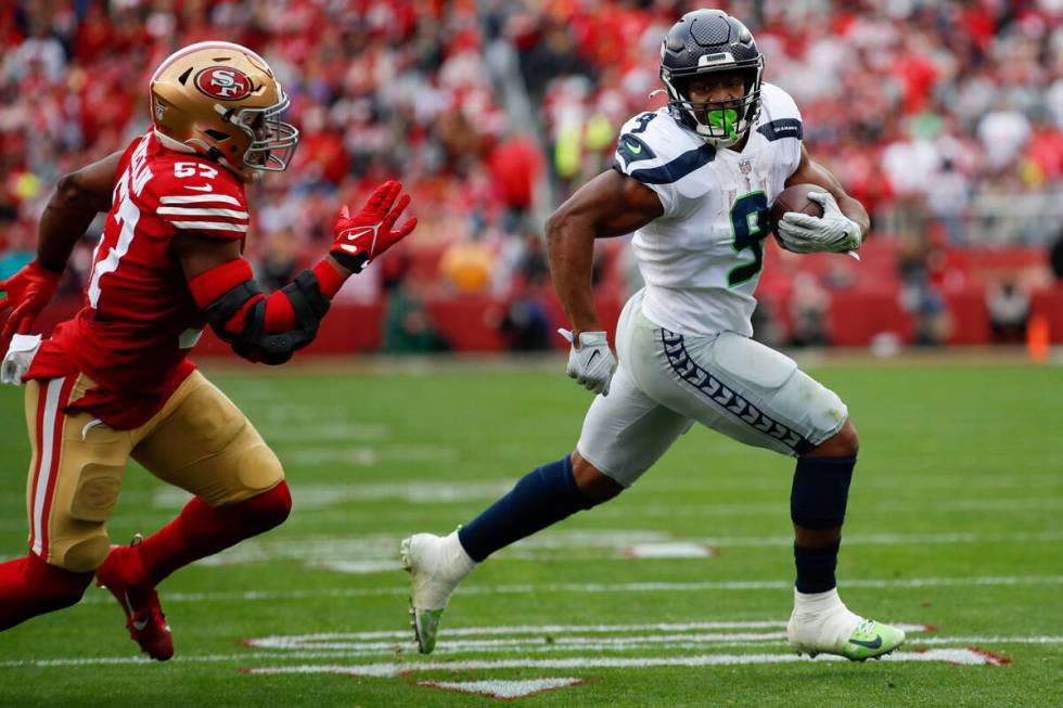 Seattle Seahawks running back Kenneth Walker III (9) runs for a touchdown against San Francisco ...