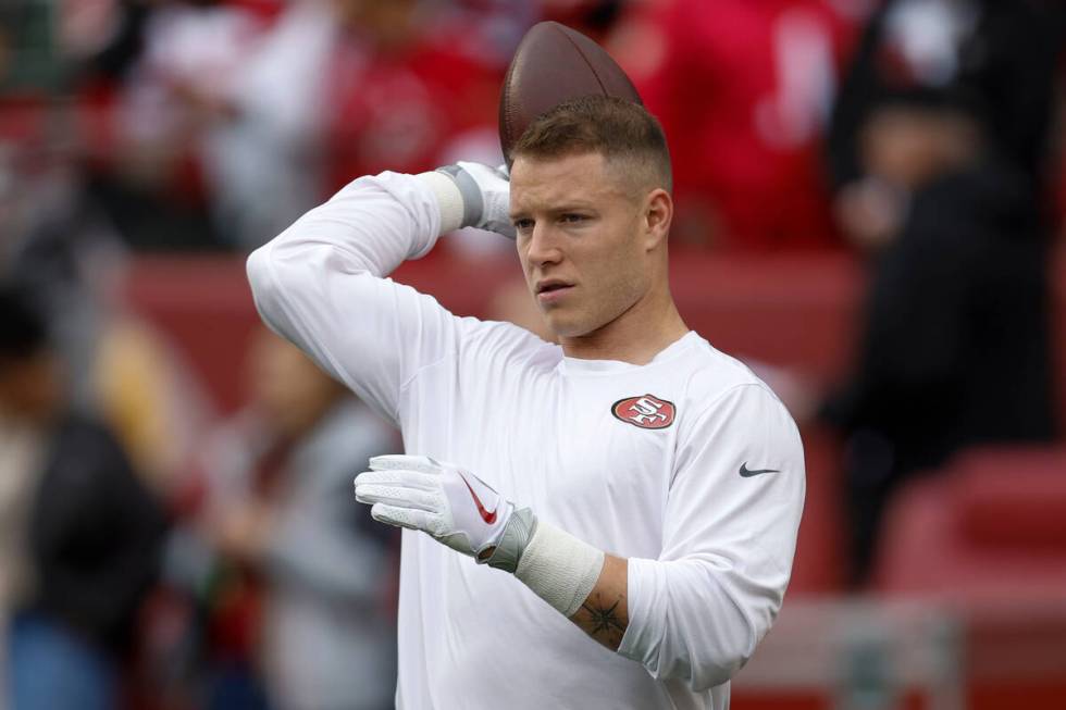 San Francisco 49ers running back Christian McCaffrey warms up before an NFL wild card playoff f ...