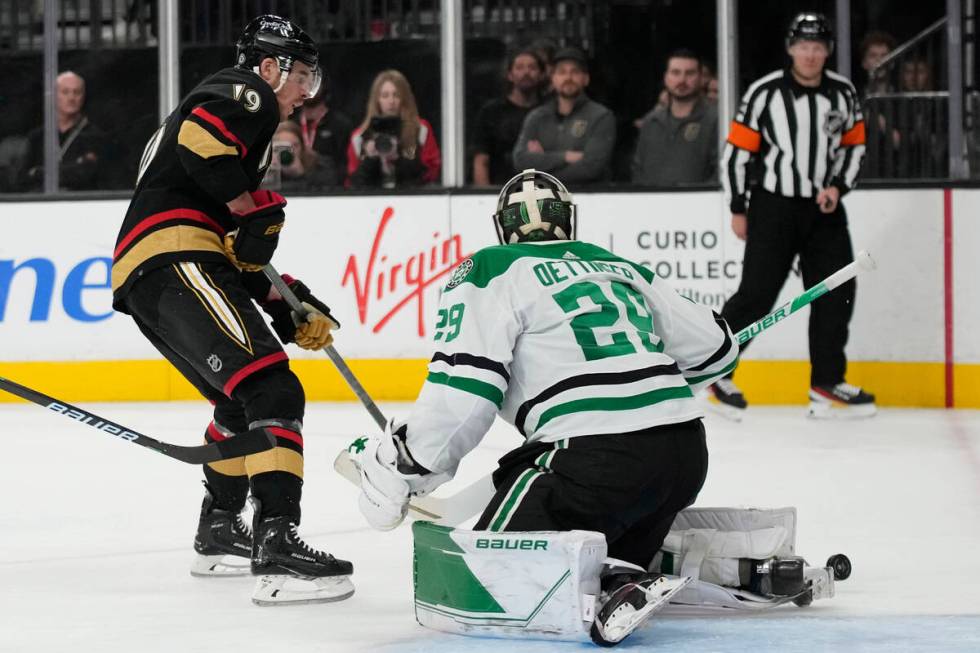 Dallas Stars goaltender Jake Oettinger (29) blocks a shot by Vegas Golden Knights right wing Re ...