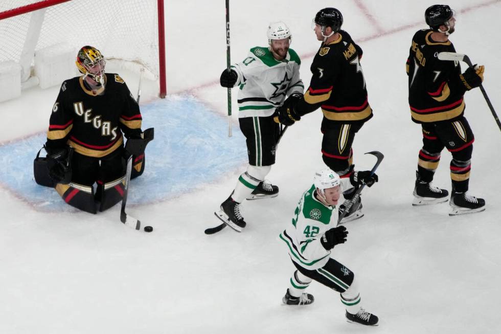 Dallas Stars' Fredrik Olofsson (42) and Luke Glendening (11) celebrate after teammate Joel Kivi ...