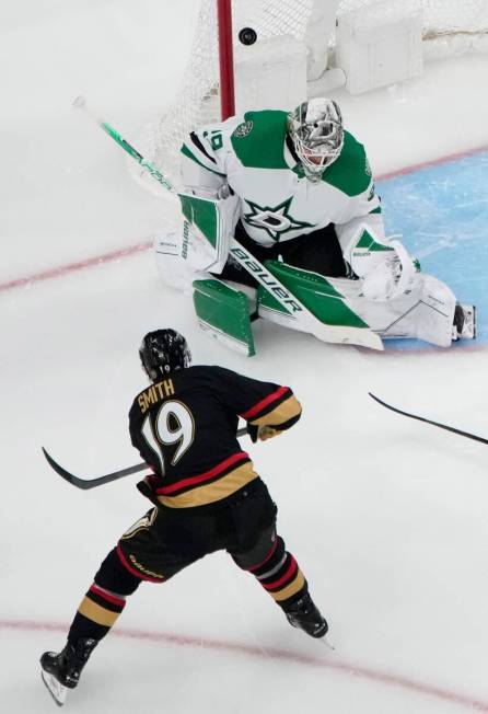 Vegas Golden Knights right wing Reilly Smith (19) attempts a shot on Dallas Stars goaltender Ja ...