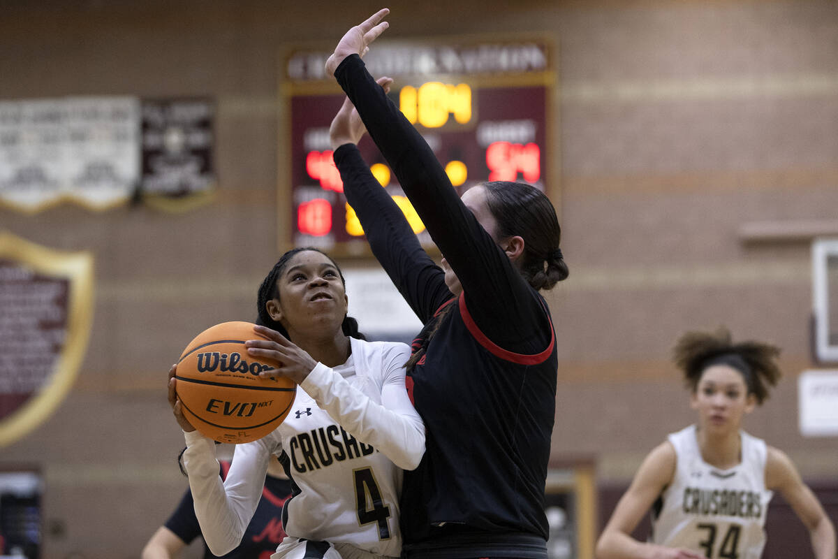 Faith Lutheran’s Tamiah Harrison (4) shoots against Coronado’s Ashtyn Wick, right ...