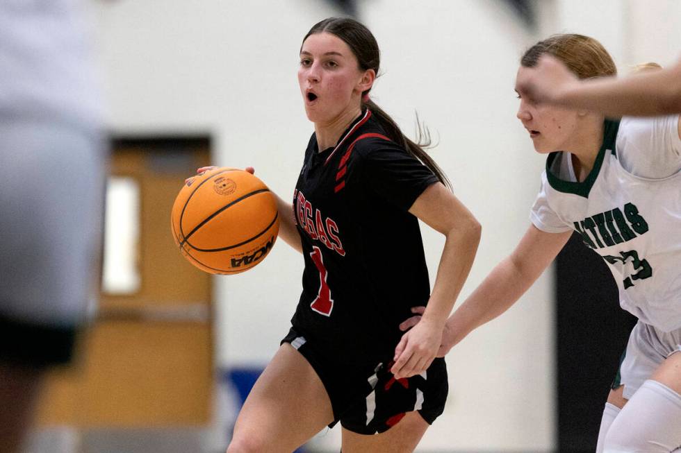 Las Vegas’ Layla Faught (1) drives around Palo Verde’s Breanna Scholz (23) during ...