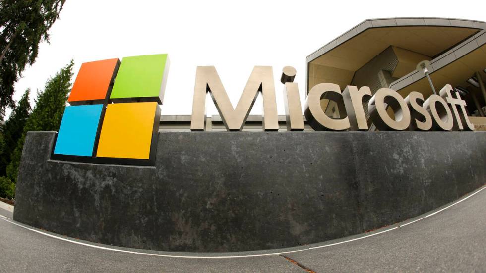 FILE - This July 3, 2014, file photo, shows the Microsoft Corp. logo outside the Microsoft Visi ...