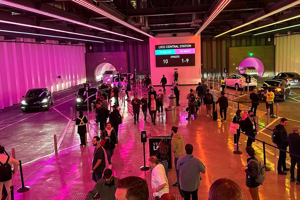 CES attendees in Central Station of the Boring Company's Vegas Loop at the Las Vegas Convention ...