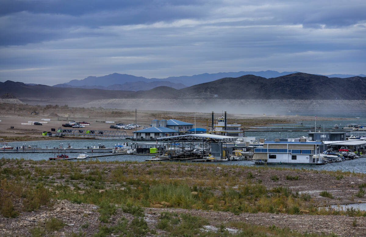 Dust is kicked up from a bulldozer with Las Vegas Boat Harbor at the Lake Mead National Recreat ...