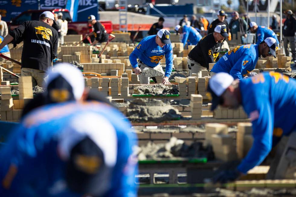 Masons participate in the World of Concrete Convention bricklaying competition at the Las Vegas ...