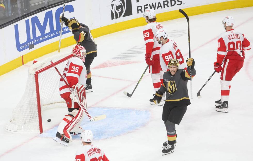 Golden Knights center William Karlsson, right, celebrates a goal by defenseman Alex Pietrangelo ...