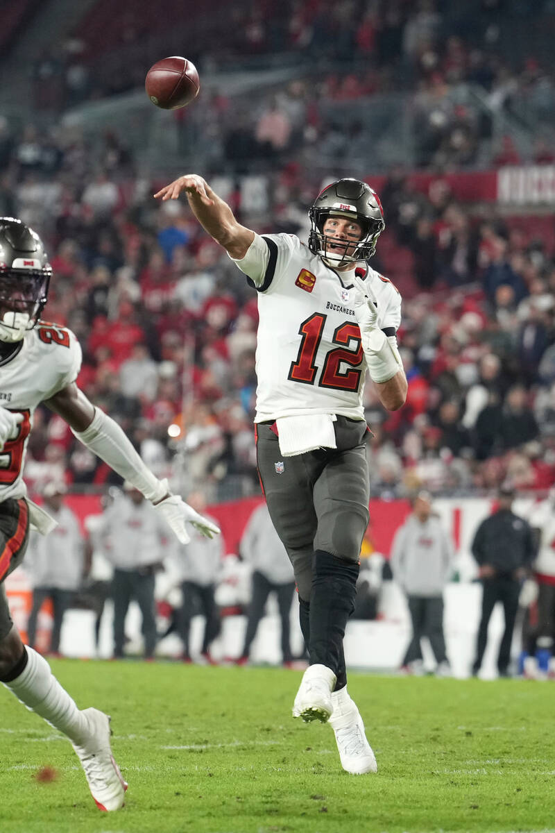 Tampa Bay Buccaneers quarterback Tom Brady (12) makes a successful throw for a two-point conver ...