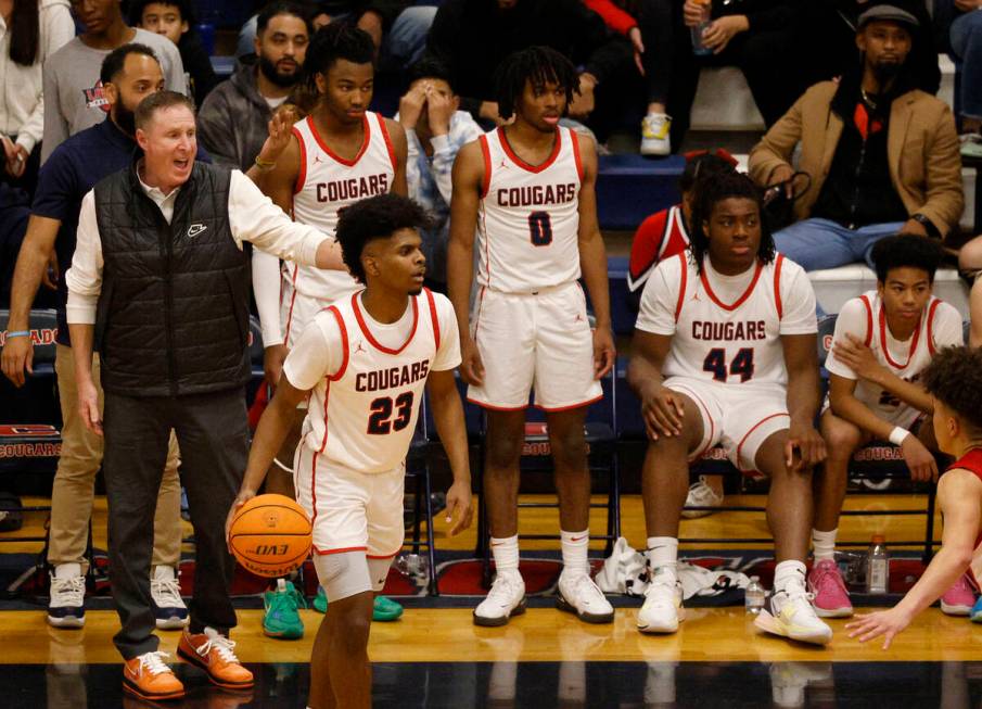 Coronado’s head coach Jeff Kaufman, left, speaks to players during the second half of a ...