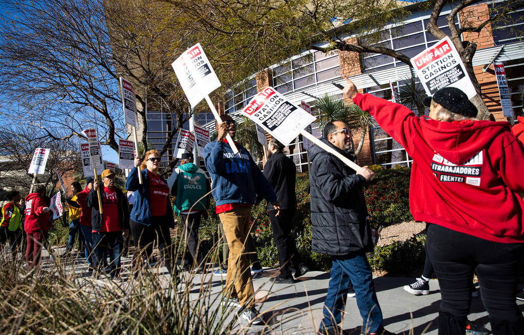 Culinary Local 226 members picket outside of Station Casinos headquarters on Thursday, Jan. 19, ...