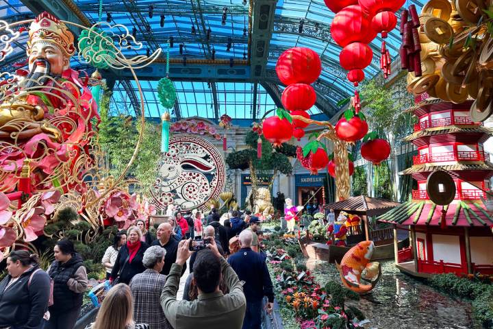 Guest walk through the Year of the Rabbit display celebrating Lunar New Year at the Bellagio Co ...