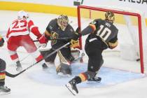 Detroit Red Wings left wing Lucas Raymond (23) scores a goal past Golden Knights goaltender Adi ...