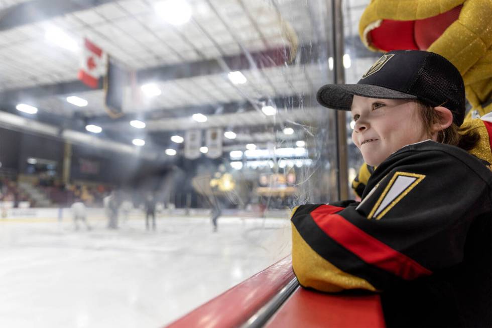 Annabelle Hanson of Janesville, Calif, an 8-year-old with cystic fibrosis, watches the Golden K ...