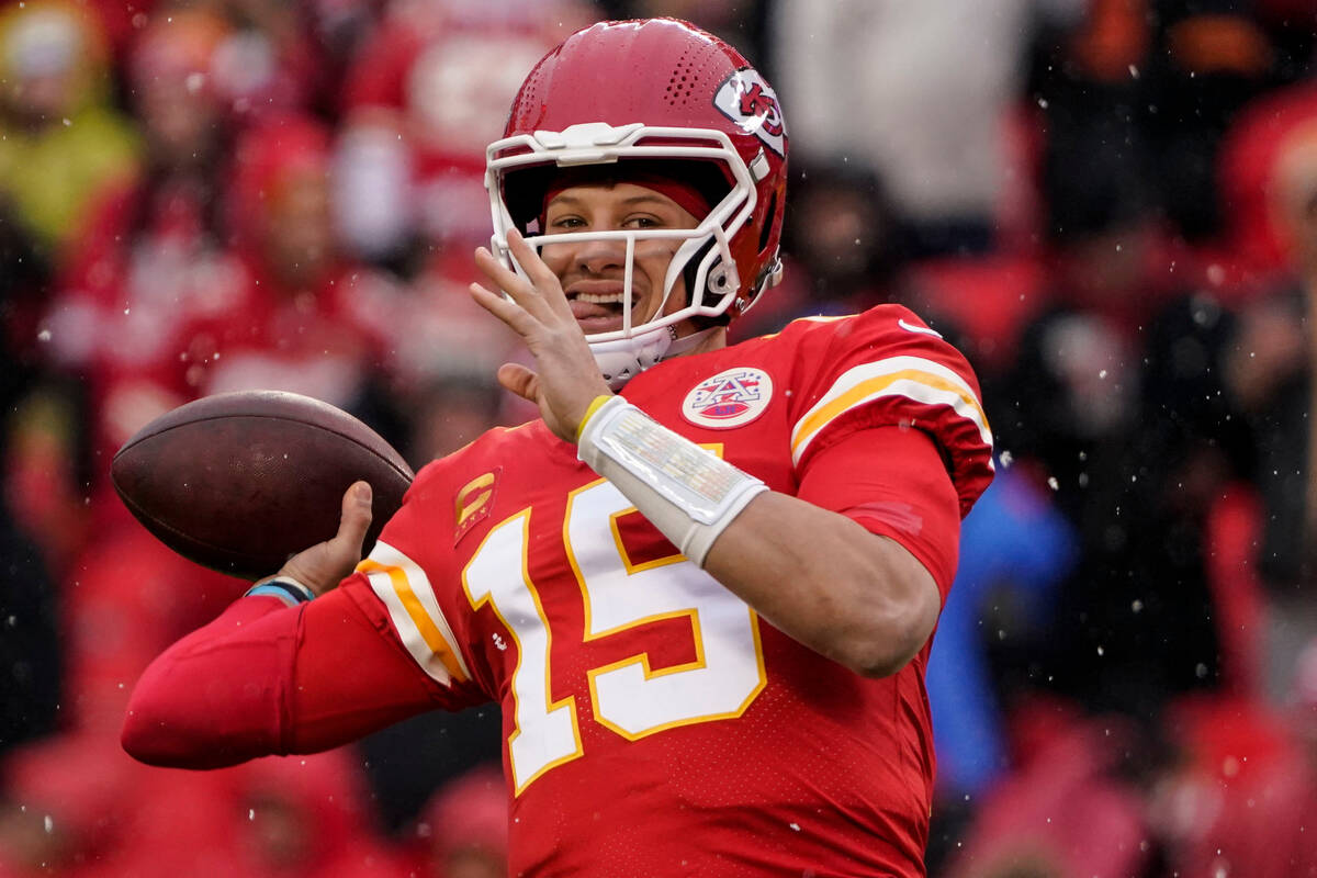 Kansas City Chiefs quarterback Patrick Mahomes (15) warms up before an NFL divisional round pla ...