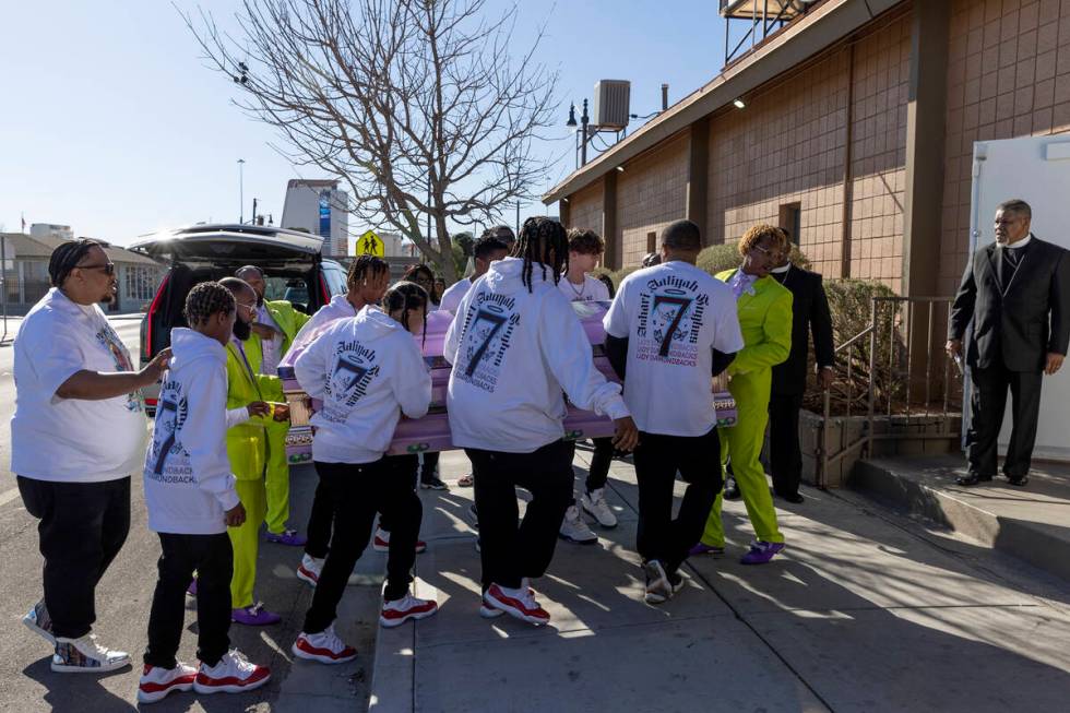 Loved ones of Ashari Hughes carry the 16-year-old’s casket in for her memorial at New Be ...