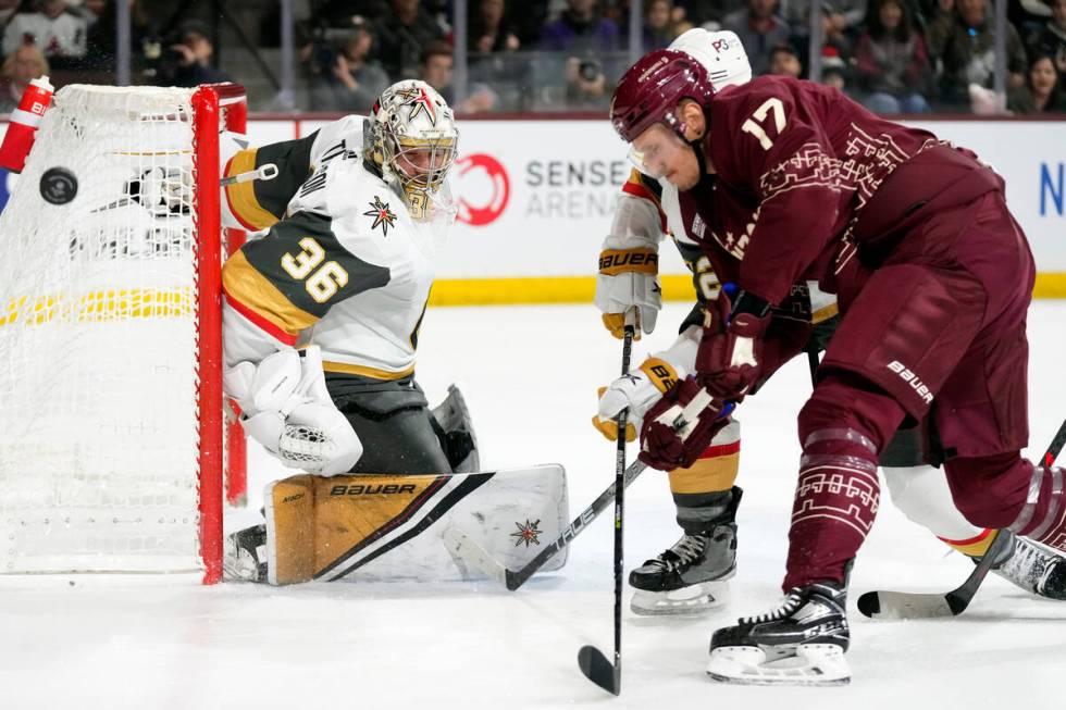 Vegas Golden Knights goaltender Logan Thompson (36) makes a save against a shot by Arizona Coyo ...