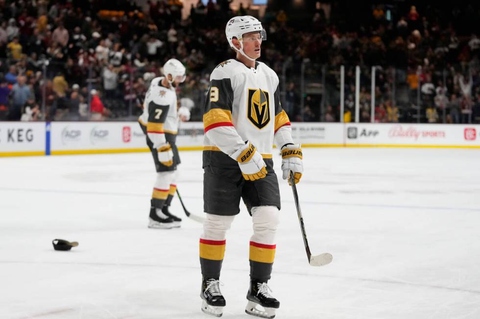 Vegas Golden Knights center Jack Eichel (9) and defenseman Alex Pietrangelo (7) pause on the ic ...