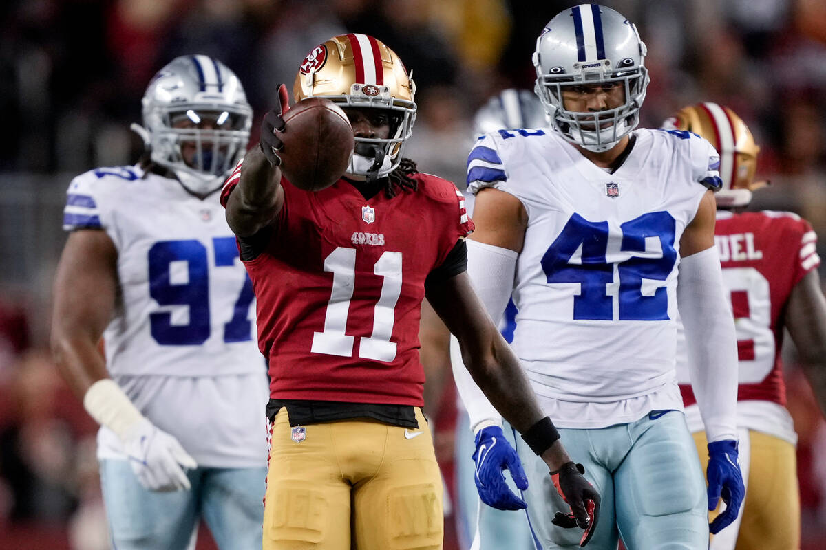 San Francisco 49ers wide receiver Brandon Aiyuk (11) gestures during the second half of an NFL ...