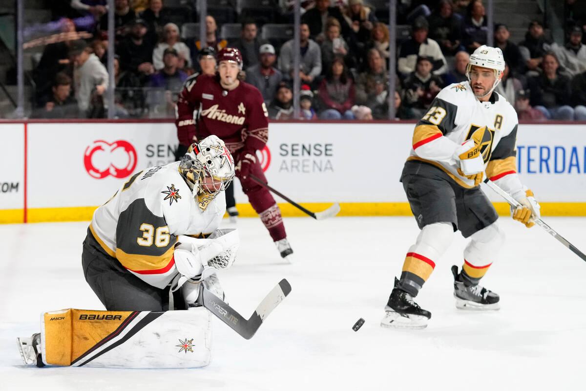 Vegas Golden Knights goaltender Logan Thompson (36) makes a save on a shot as Arizona Coyotes r ...