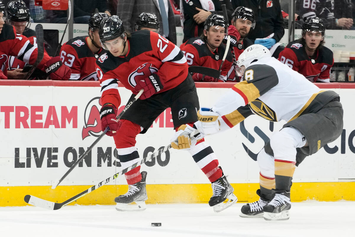 New Jersey Devils center Michael McLeod (20) skates against Vegas Golden Knights right wing Phi ...