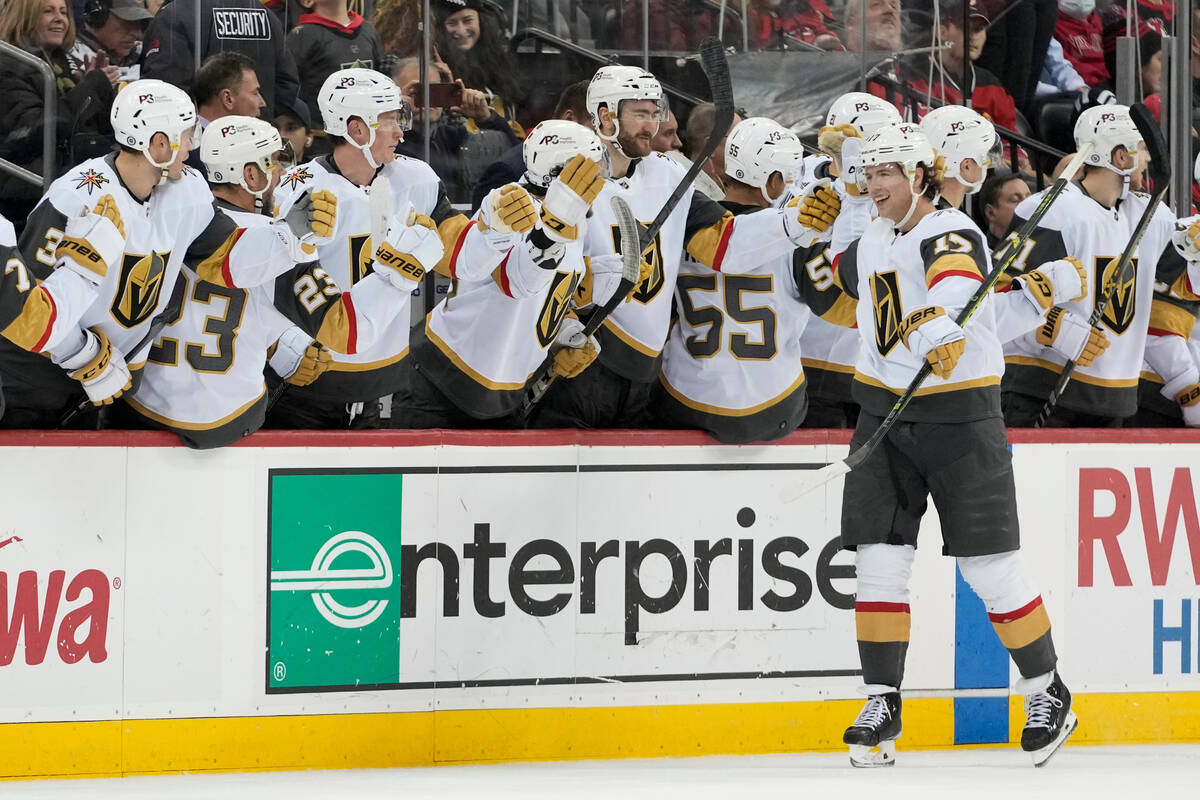 Vegas Golden Knights defenseman Ben Hutton (17) celebrates after scoring against the New Jersey ...