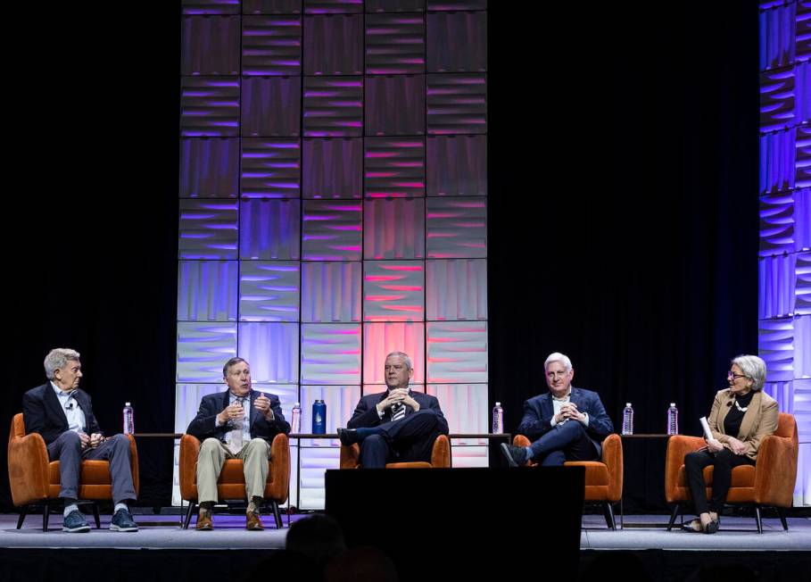 Tom Buschatzke, director of the Arizona Department of Water Resources, second left, speaks as S ...