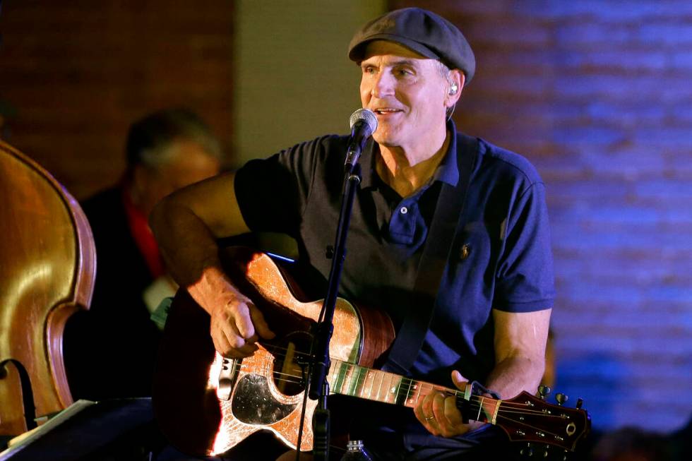 FILE - In this Nov. 6, 2016 file photo, musician James Taylor performs during a campaign event ...