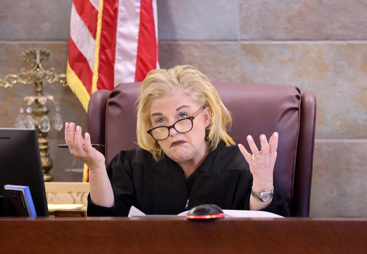 District Judge Michelle Leavitt asks a question in court on Wednesday, Jan. 25, 2023, during a ...