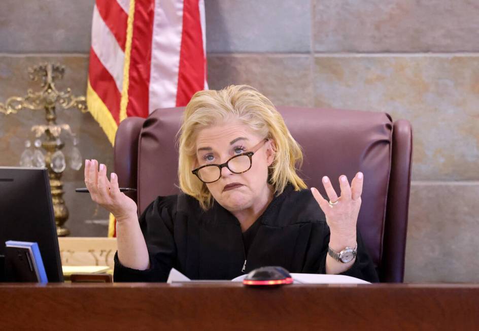 District Judge Michelle Leavitt asks a question in court on Wednesday, Jan. 25, 2023, during a ...