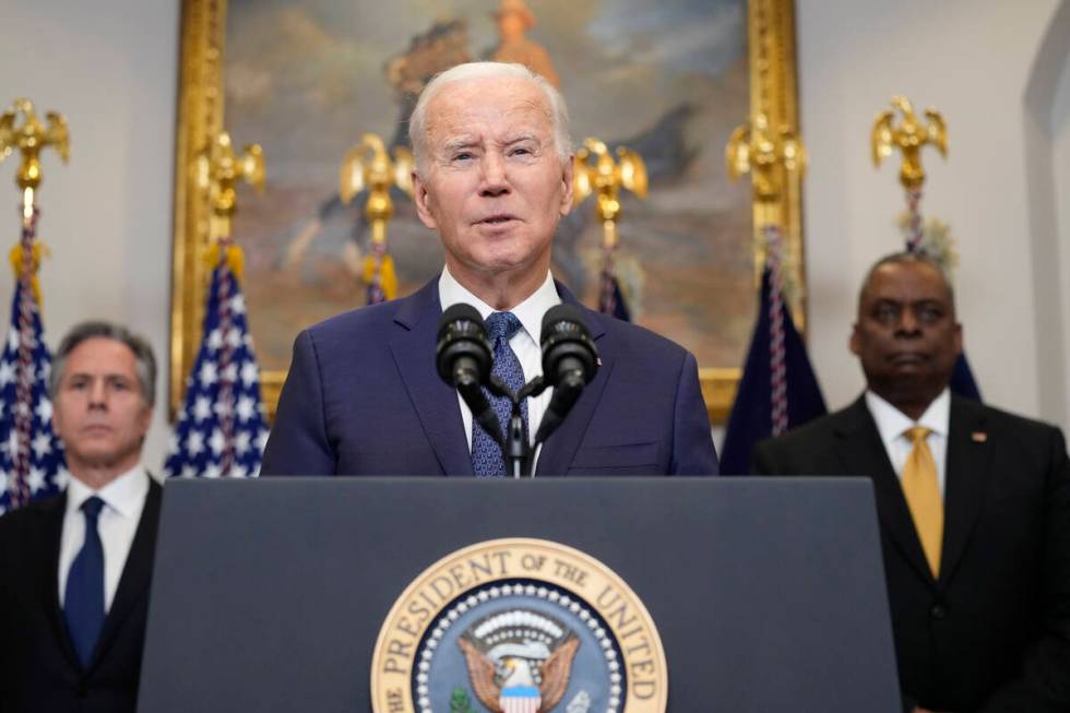 President Joe Biden speaks about Ukraine from the Roosevelt Room at the White House in Washingt ...