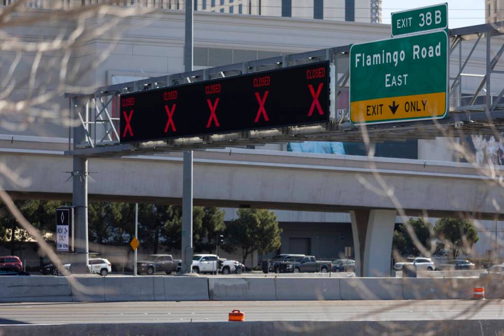 The completely closed I-15 freeway between Russell and Flamingo roads is seen from near the Fla ...