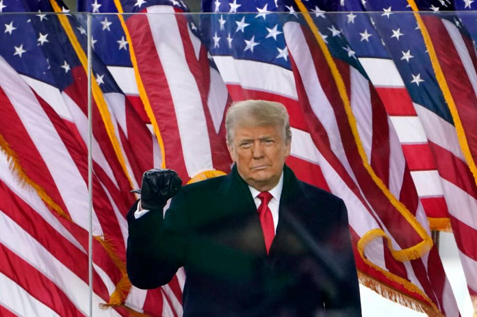 President Donald Trump gestures as he arrives to speak at a rally on Jan. 6, 2021, in Washingto ...