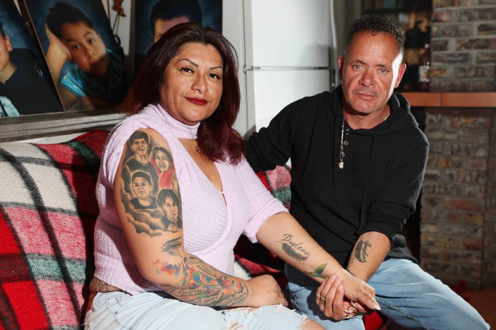 Erlinda Zacarias, left, and husband Jesus Mejia-Santana, pose for a portrait at their North Las ...