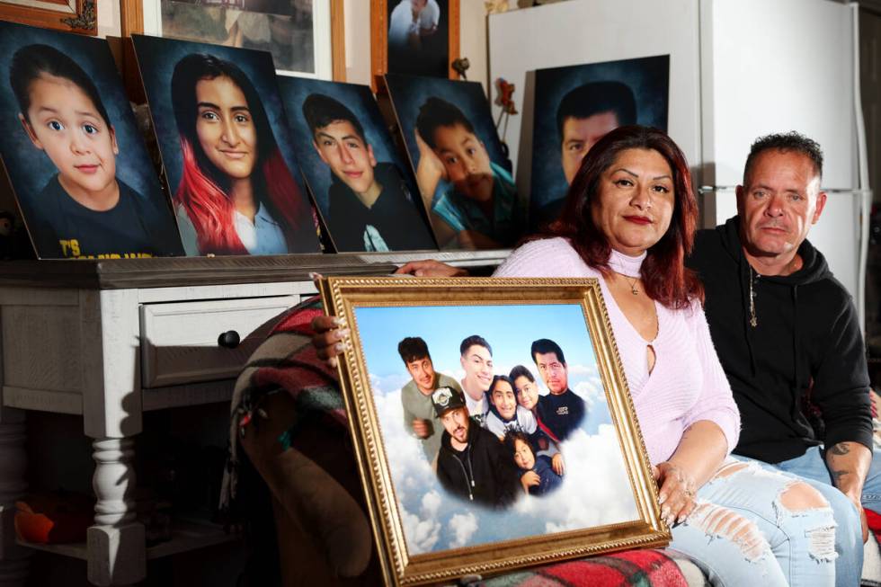 Erlinda Zacarias, left, and husband Jesus Mejia-Santana, pose for a portrait at their North Las ...