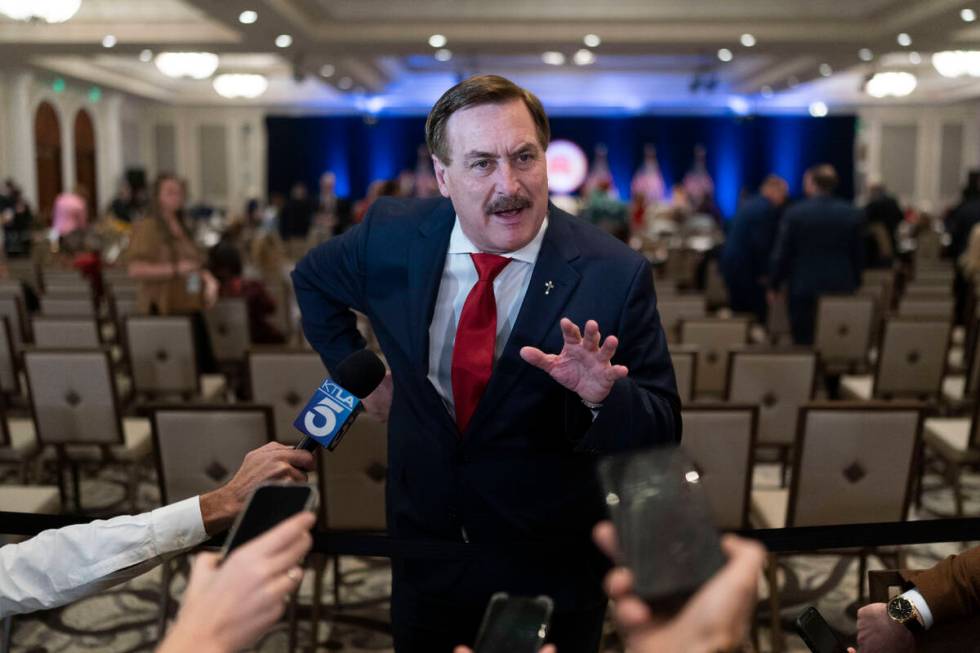 MyPillow CEO Mike Lindell talks to reporters at the Republican National Committee winter meetin ...