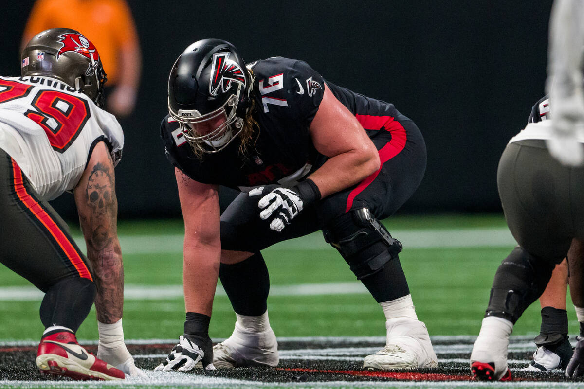 Atlanta Falcons offensive tackle Kaleb McGary (76) lines up during the second half of an NFL fo ...