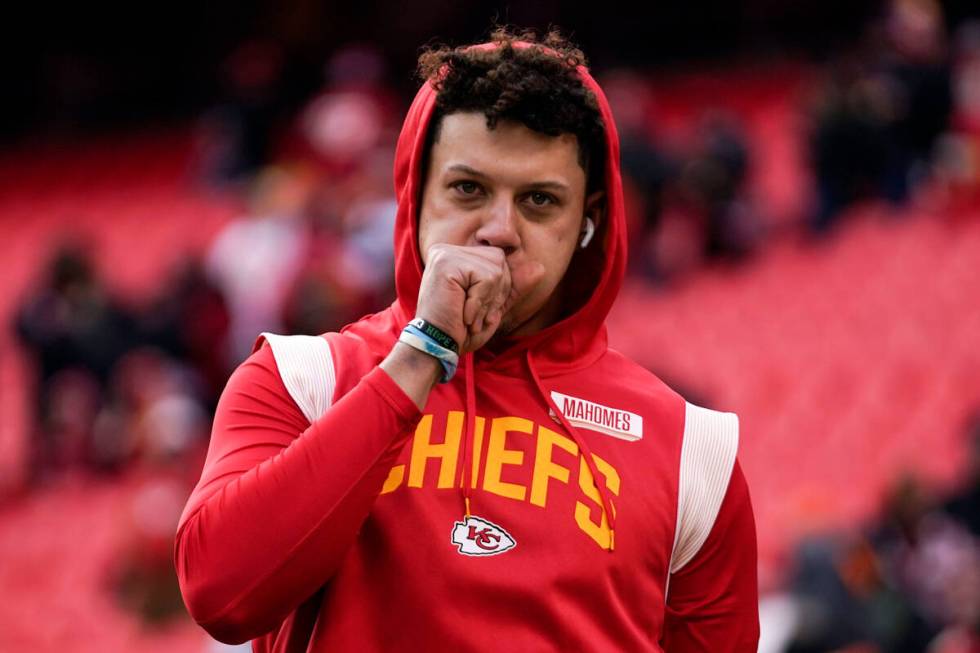 Kansas City Chiefs quarterback Patrick Mahomes warms up before the NFL AFC Championship playoff ...