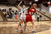 Cimarron-Memorial’s Kayley Israel (4) guards Doral’s Peyton Gomez (13) during a g ...