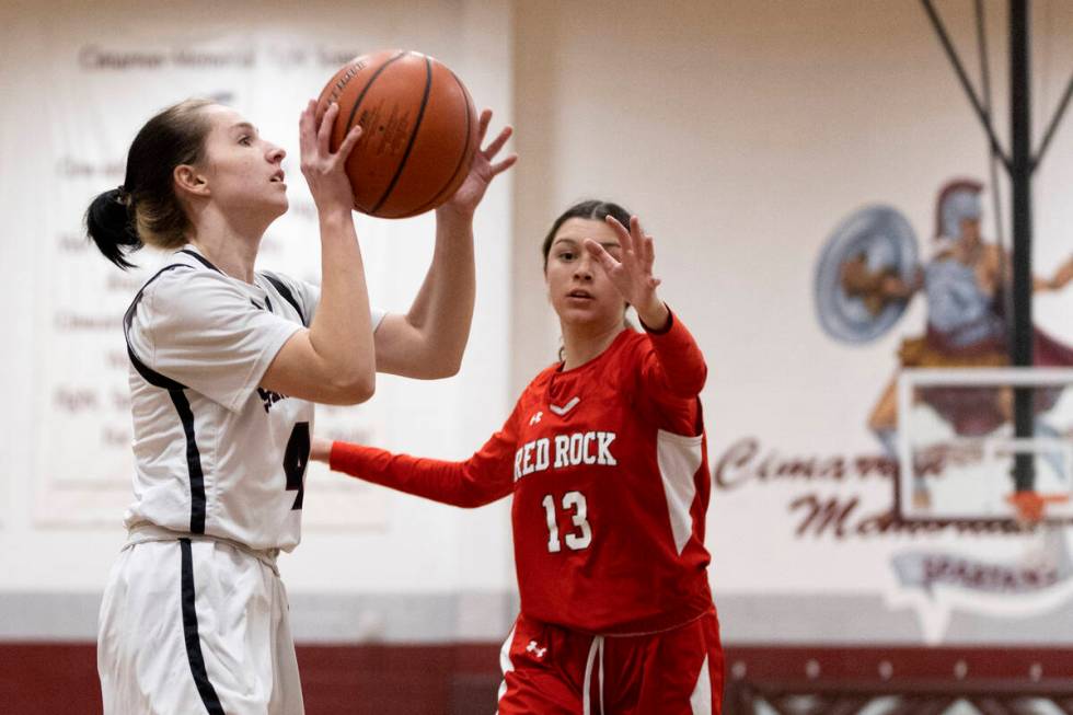 Cimarron-Memorial’s Kayley Israel (4) prepares to shoot against Doral’s Peyton Go ...