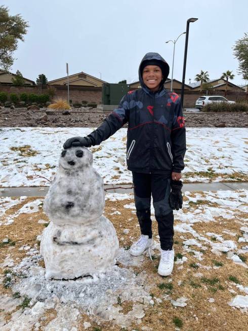 6th-grader Daylen with his snowman at McCullough Vista Park