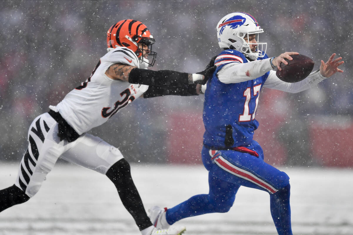 Cincinnati Bengals safety Jessie Bates III (30) chases down Buffalo Bills quarterback Josh Alle ...