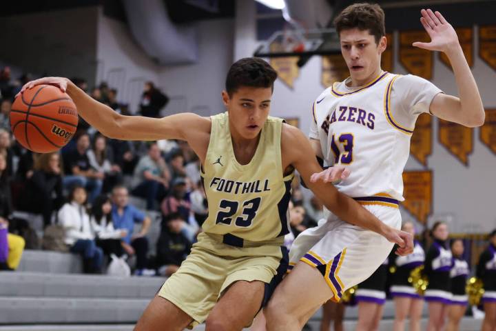 In this Jan. 6, 2023, file photo, Foothill's Shawn Salazar (23) keeps a ball away from Durango' ...