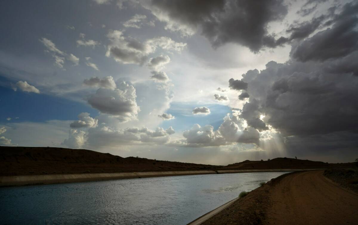 Water flows along the All-American Canal Saturday, Aug. 13, 2022, near Winterhaven, Calif. (AP ...