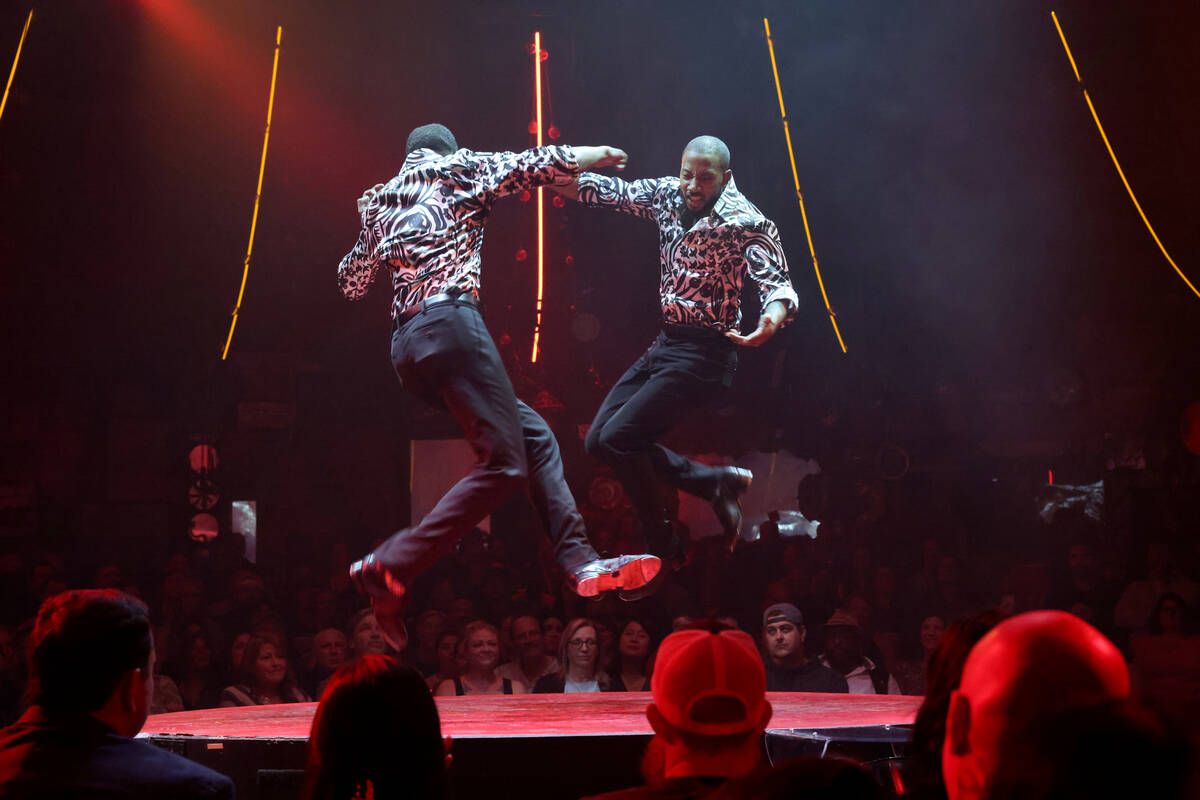 Twin brothers Sean and John Scott tap dance during “Absinthe” at Caesars Palace o ...