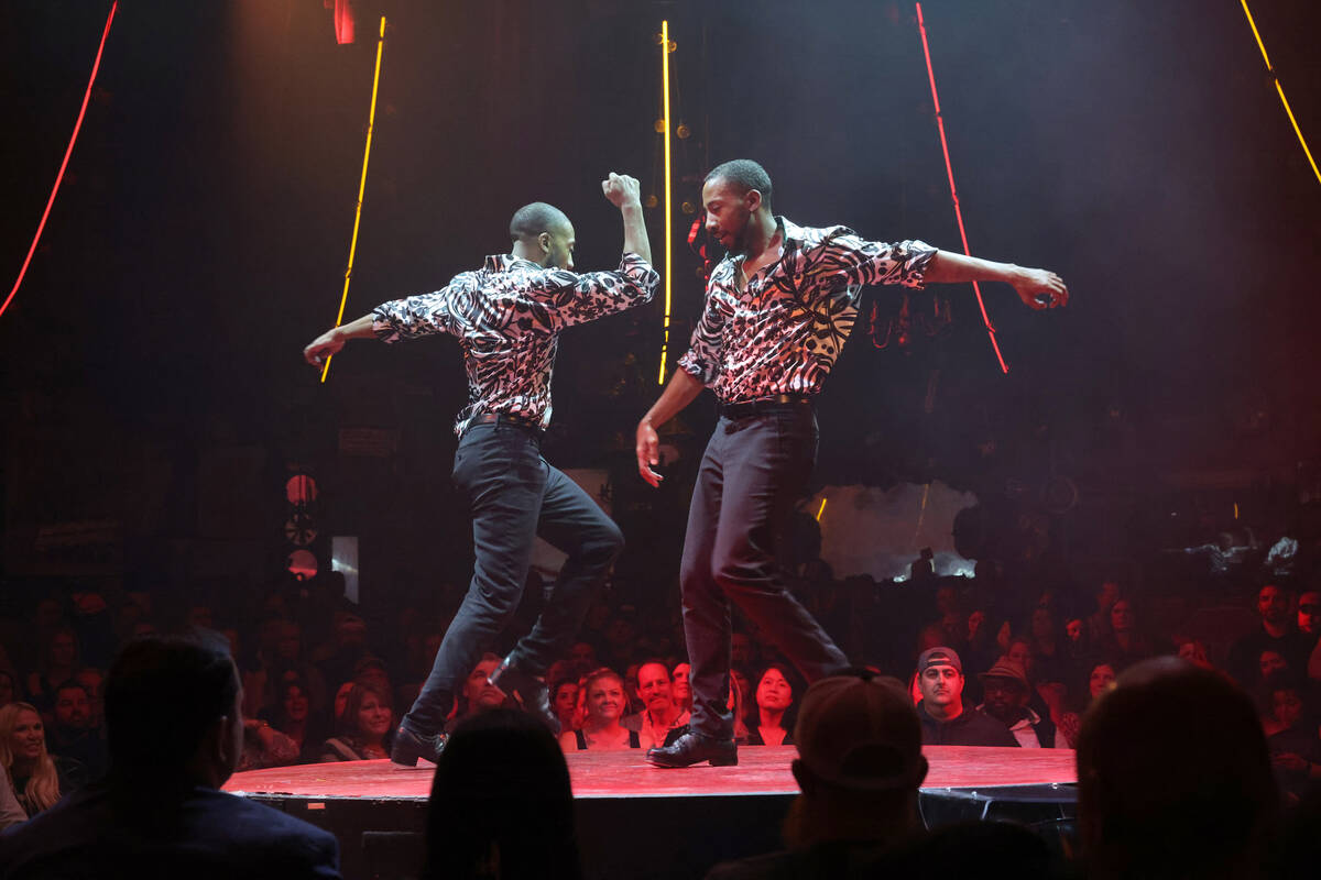 Twin brothers Sean and John Scott tap dance during “Absinthe” at Caesars Palace o ...