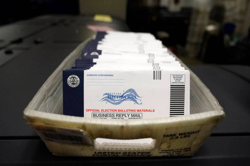 FILE—This file photo from Oct. 23, 2020, shows mail-in ballots for the U.S. 2020 General ...