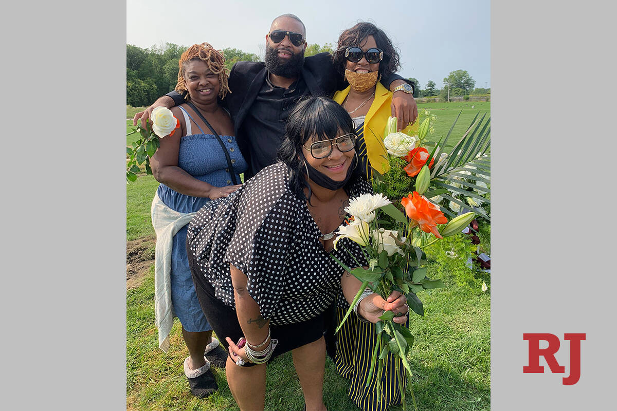Justin Scott with, from left, his sisters Shalonda and Katrina Scott and their mother, Joan Sco ...