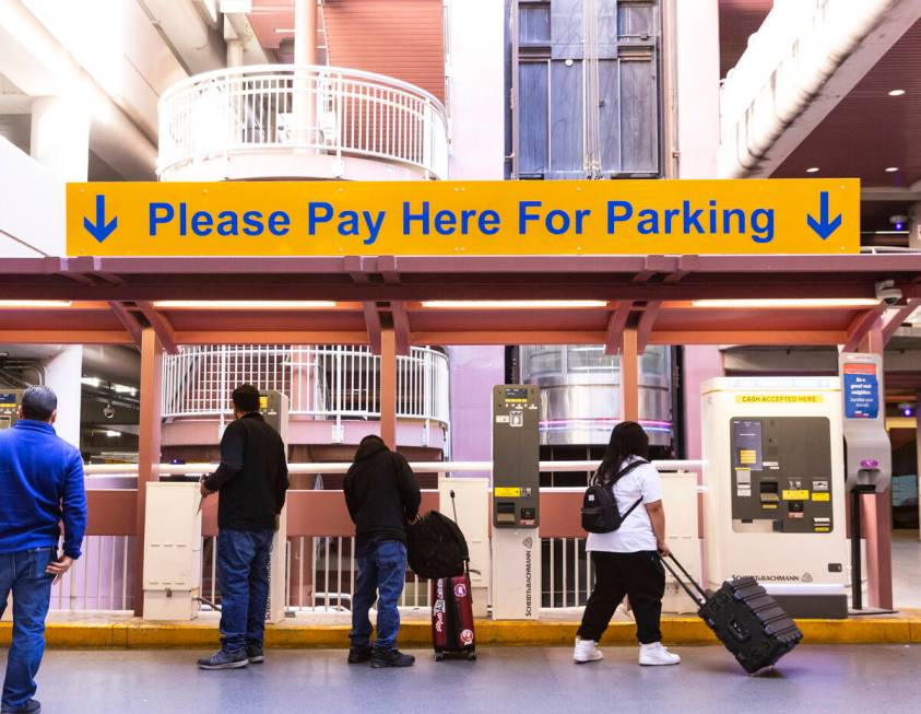 Arriving passengers pay their parking fee at the level 2 of Terminal 1 parking lot at Harry Rei ...