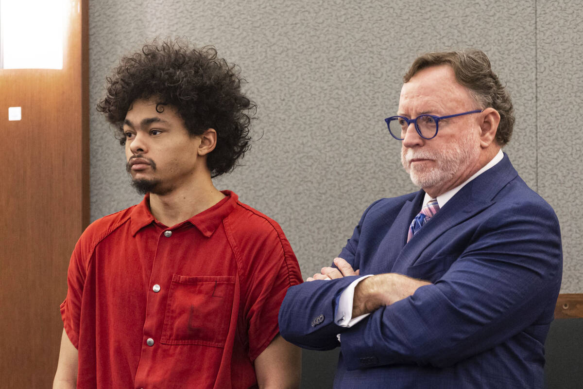 Tyson Hampton, charged in the fatal shooting of officer Truong Thai, appears in court with defe ...